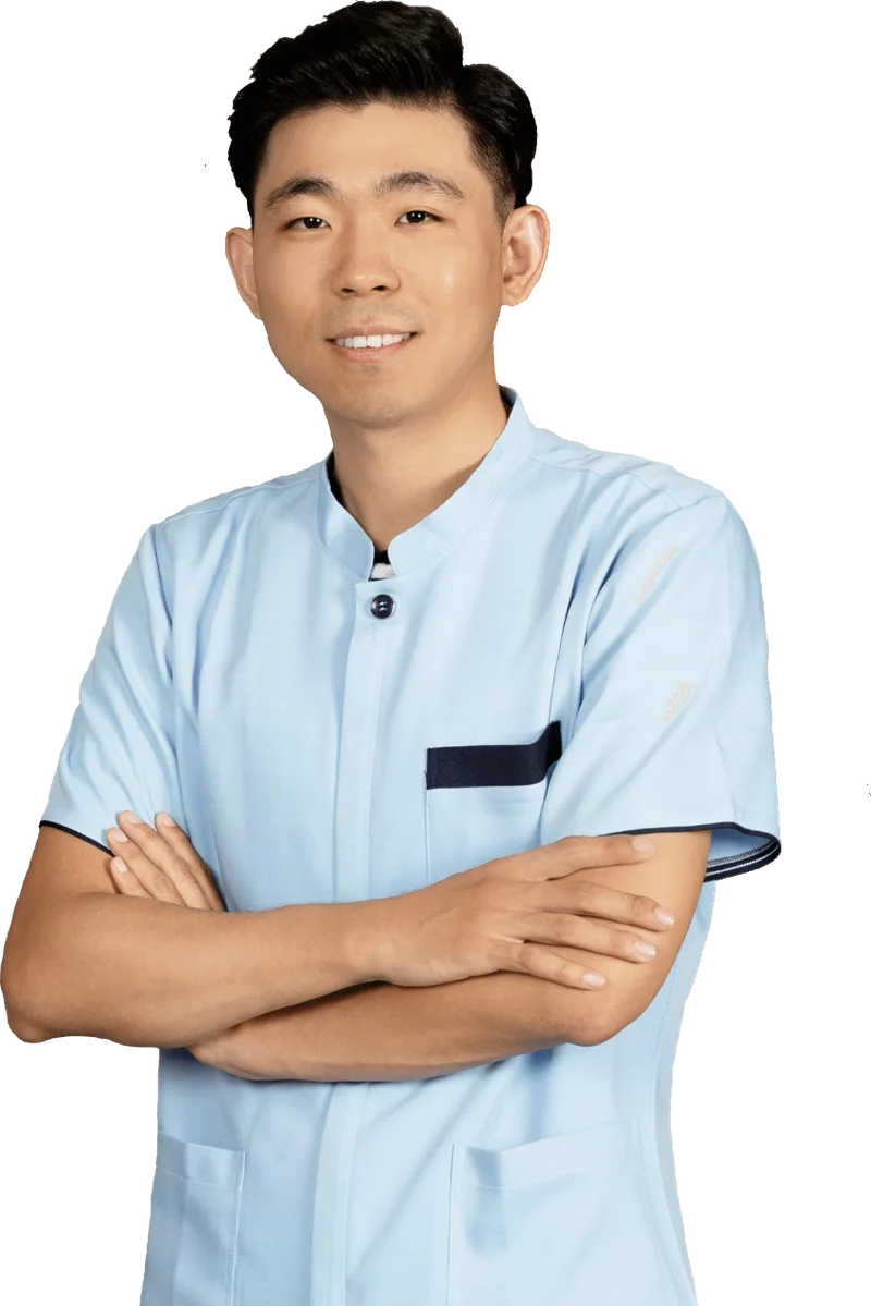 Jimin Hwang, Licensed Acupuncturist, smiling with arms crossed